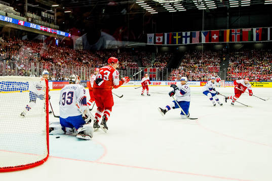 Nicklas Jensen of Denmark scores 2-0 behind goaltender