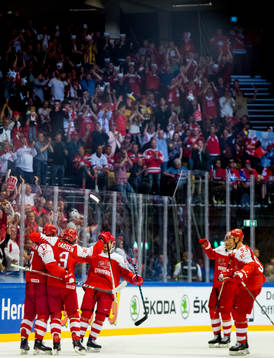Nicklas Jensen of Denmark celebrates with teammates
