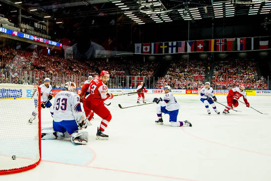 Nicklas Jensen of Denmark scores 2-0 behind goaltender