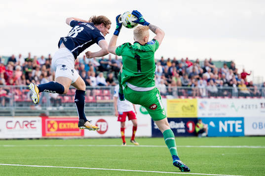 Julian Ryerson of Viking and goalkeeper Julian Rekdahl Faye