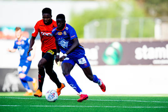 Michael Olusoji Ogungbaro of Åsane and Pape Habib Gueye of