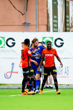 Oddbjørn Lie of Aalesund and Dennis Agyare Antwi of Åsane