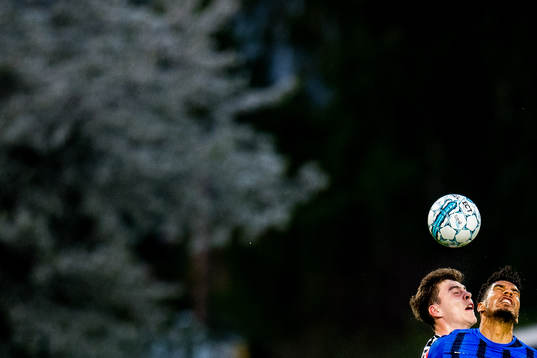 Jacob Rasmussen of Rosenborg and Ohi Omoijuanfo of Stabæk