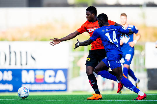 Michael Olusoji Ogungbaro of Åsane and Pape Habib Gueye of