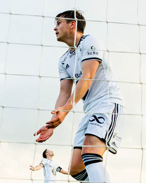 Pål André Helland and Mike Jensen of Rosenborg react