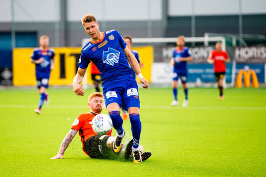Aleksander Solli of Åsane and Hólmbert Fridjónsson of