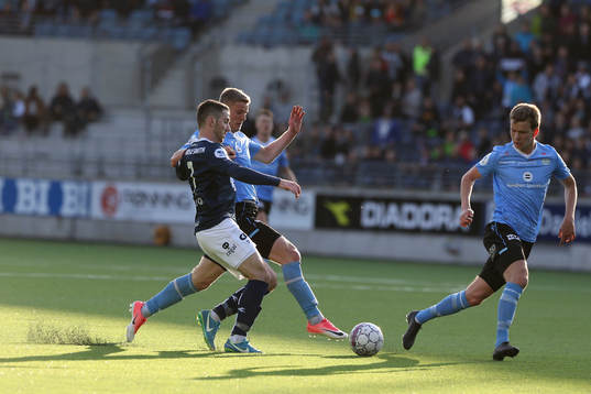 Zymer Bytyqi from Viking in action against Ari Jonsson from