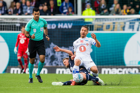 Stian Semb Aasmundsen of Kristiansund and Mads Reginiussen