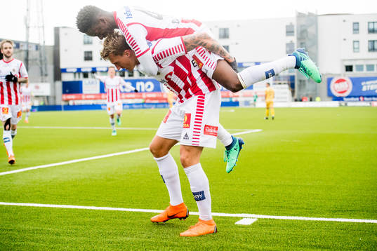 Runar Espejord and Mushaga Bakenga of Tromsø celebrate the