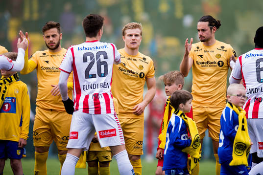 The players greet each other