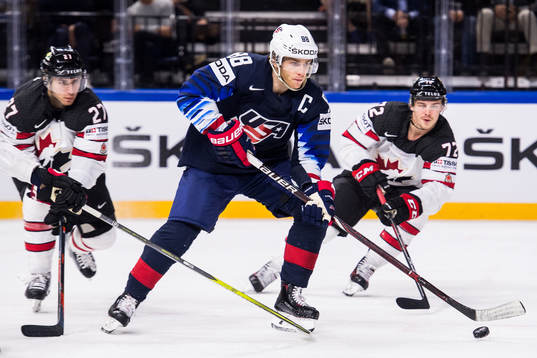 s Patrick Kane mot Kanadas Ryan Murray och Anthony