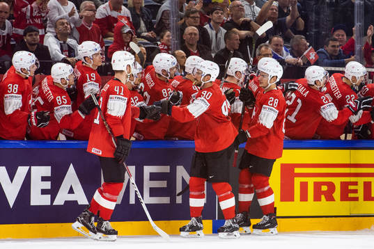 Schweiz Mirco Muller, Joel Roman och Timo Meier spelare