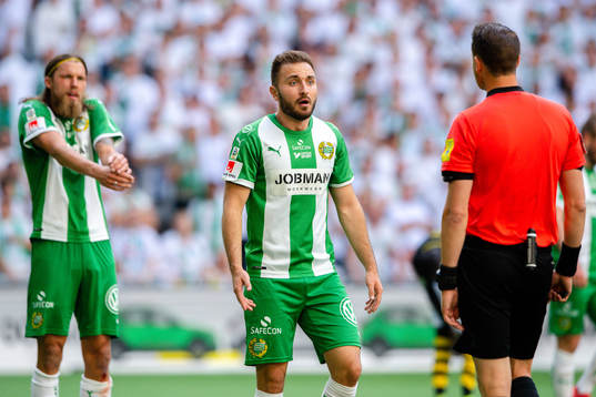 Hammarbys Björn Paulsen och Muamer Tankovic  i samtal med