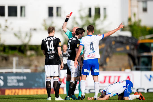 Jacob Rasmussen of Rosenborg is shown a red card by Trond