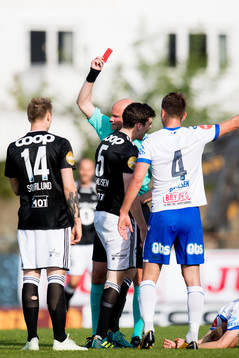 Jacob Rasmussen of Rosenborg is shown a red card by Trond