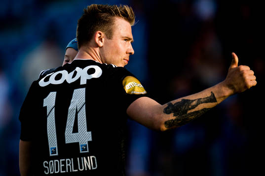 Alexander Søderlund of Rosenborg celebrates with his son