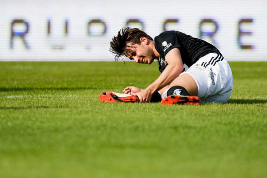 Anders Trondsen of Rosenborg with an injury