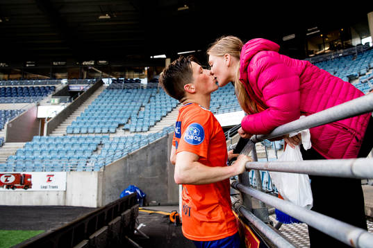 Sondre Fet of Aalesund kisses his girlfriend