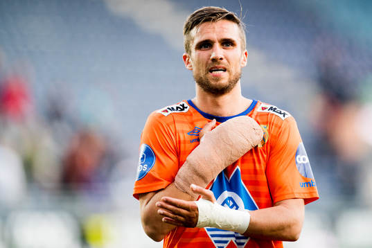 Robert Sandnes of Aalesund with an injury