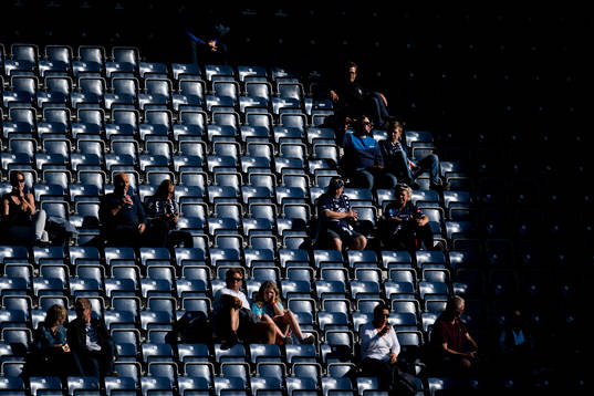 Spectators in the sun