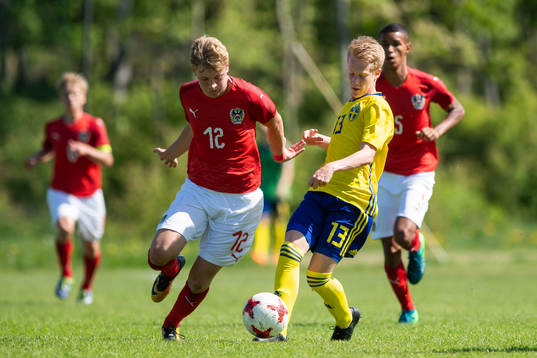 Österrikes Marcel Tanzmyar och Sveriges David Edvardsson i