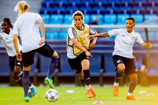 Kheira Hamraoui and Shanice van de Sanden of Lyon