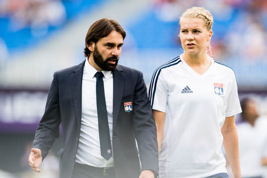 Reynald Pedros, head coach of Lyon, and Ada Hegerberg of