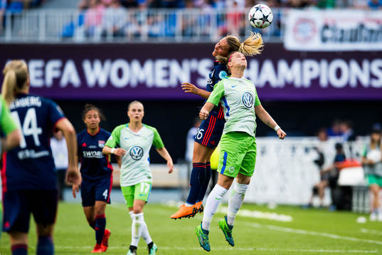 Amandine Henry of Lyon and Alexandra Popp of Wolfsburg