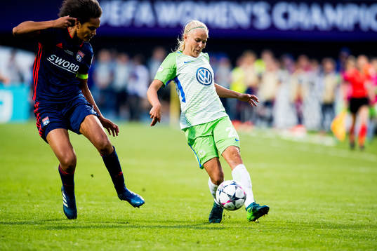 Wendie Renard of Lyon and Pernille Harder of Wolfsburg