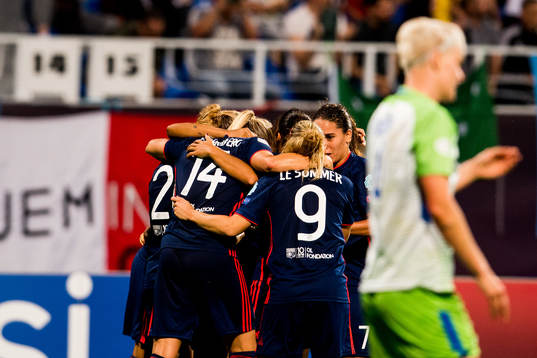 Ada Hegerberg of Lyon celebrates with teammates