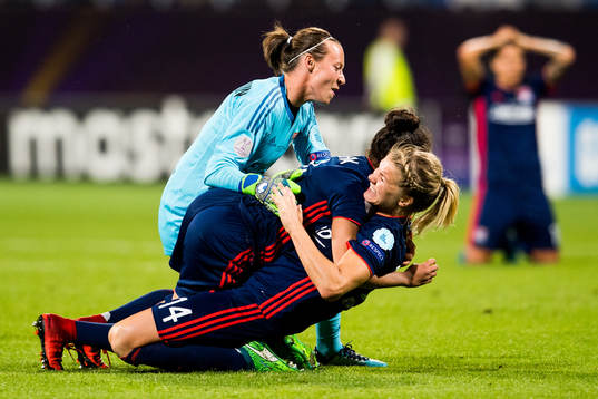 Ada Hegerberg of Lyon celebrates at the final whistle with