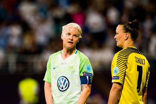 Nilla Fischer and goalkeeper Almuth Schult of Wolfsburg