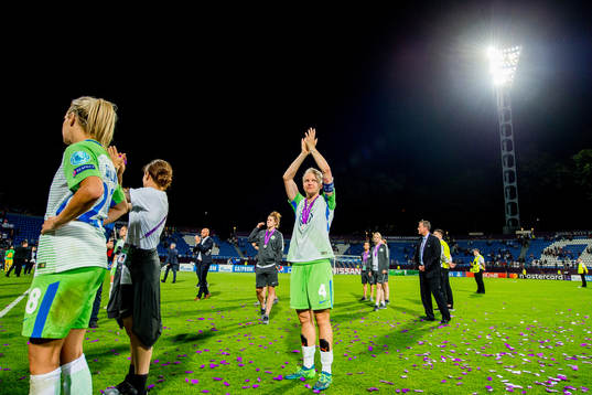 Nilla Fischer of Wolfsburg looks dejected