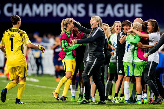 Pernille Harder of Wolfsburg celebrates with teammate