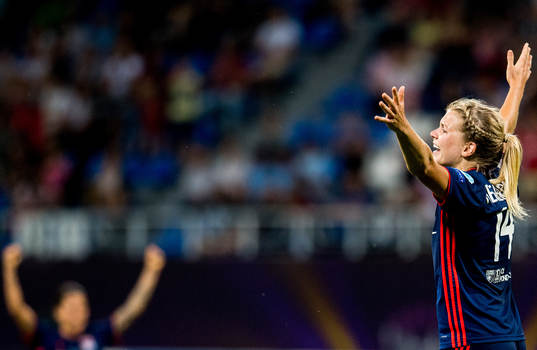 Ada Hegerberg of Lyon celebrates at the final whistle