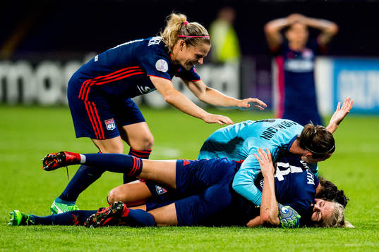 Ada Hegerberg of Lyon celebrates at the final whistle with