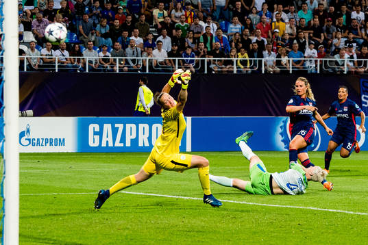 Amandine Henry of Lyon scores 1-1 behind goalkeeper Pauline