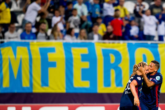 Amandine Henry of Lyon celebrates with teammate Shanice van