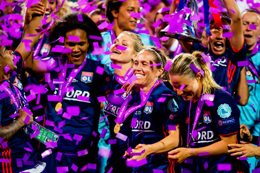 Camille Abily of Lyon celebrates
