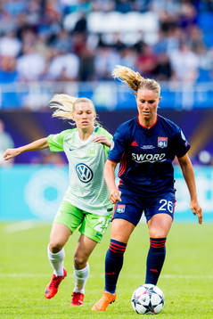 Lara Dickenmann of Wolfsburg and Amandine Henry of Lyon