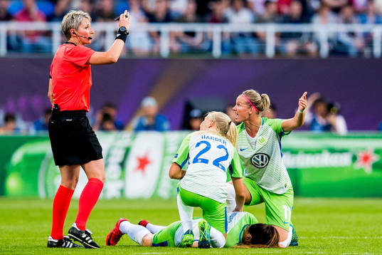 Pernille Harder and Alexandra Popp of Wolfsburg talk to