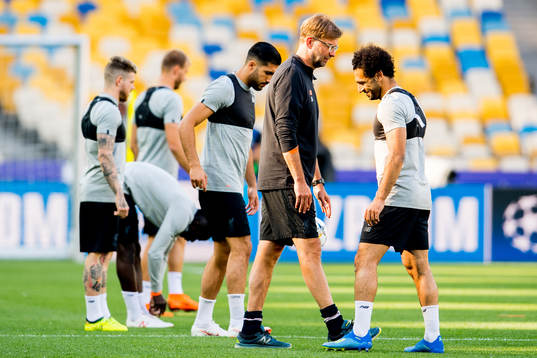 Jürgen Klopp, head coach of Liverpool, and Mohamed Salah