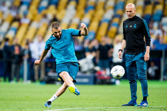 Karim Benzema of Real Madrid and Zinedine Zidane, head