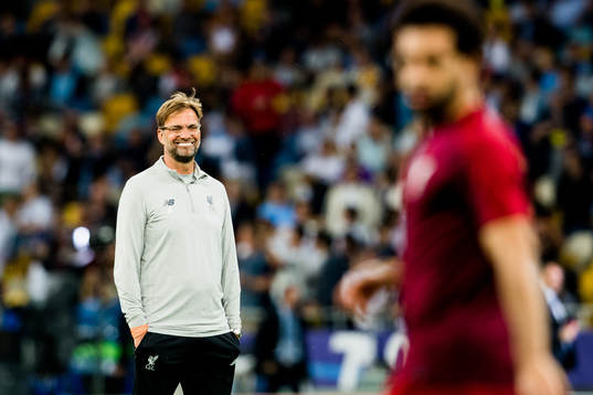 Jürgen Klopp, head coach of Liverpool, and Mohamed Salah