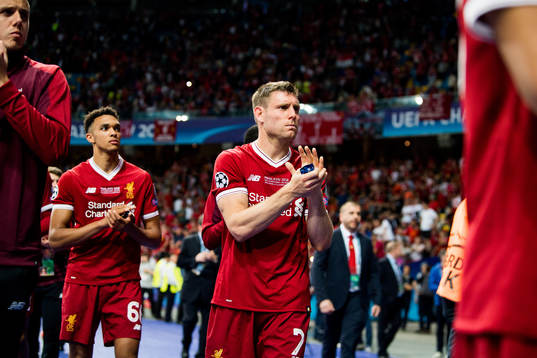 James Milner of Liverpool looks dejected