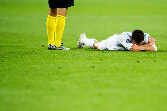 Dani Carvajal of Real Madrid with an injury