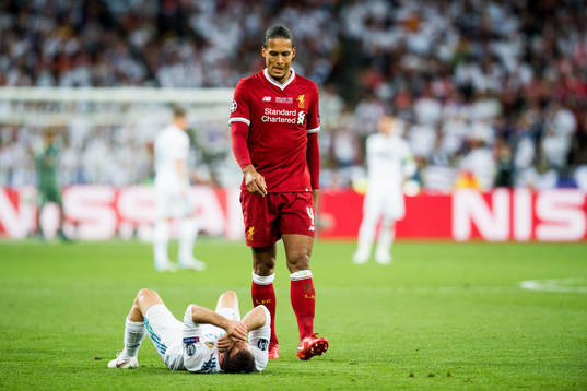 Dani Carvajal of Real Madrid and Virgil Van Dijk of