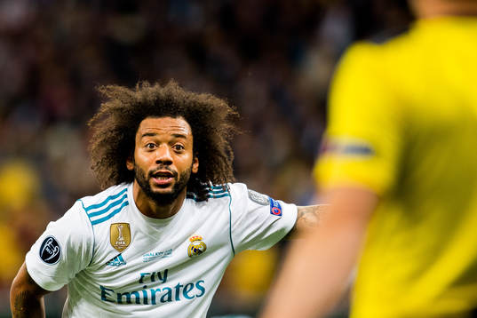 Marcelo of Real Madrid argues with the referee