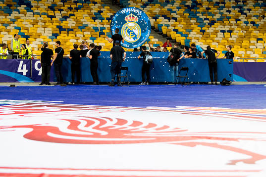 The podium is carried off the pitch
