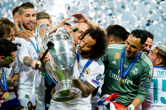 Marcelo of Real Madrid celebrates with the trophy